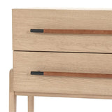 two drawers with leather wrapped pulls on oak nightstand