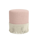 Pink upholstered ottoman with beige fringe on a white background