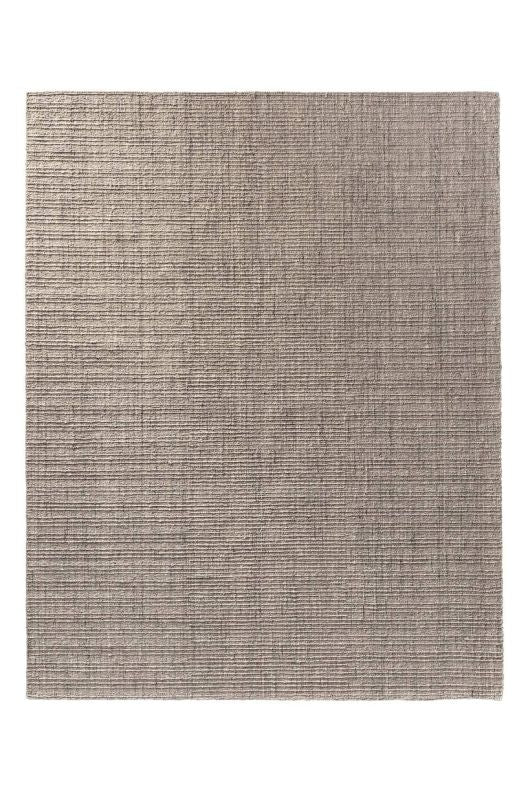 Amity rug wood ash is a rectangular grey and cream area rug with a textured, woven horizontal ribbed pattern in a warm taupe-gray color, shown flat against a solid white background.