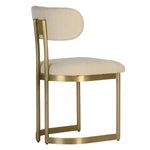 Art Deco mid-century modern chair with gold frame and beige cushion on a white background