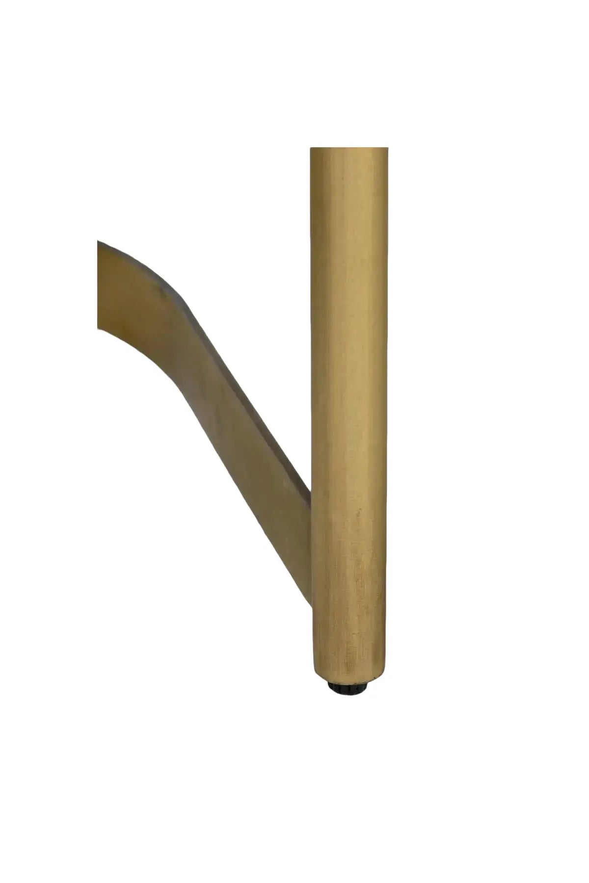 Close-up of a gold metal leg on the Shay Dining Chair on a white background