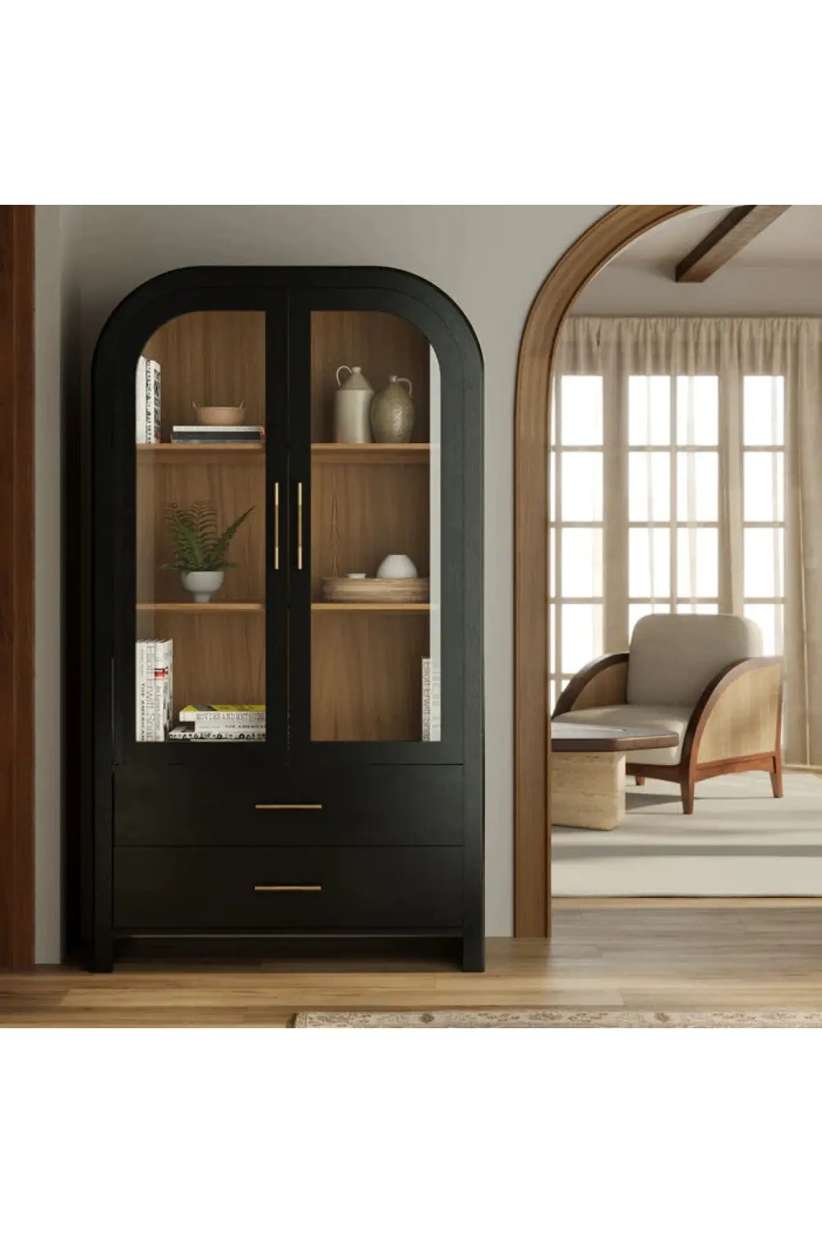 Black arched cabinet with glass doors in a living room setting