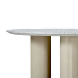 side view of round terrazzo table