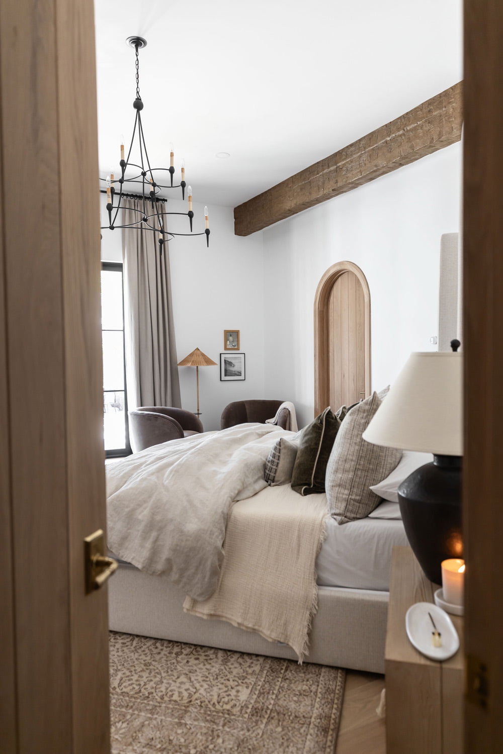Looking through an open door to a redesigned bedroom