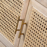 Cabinet with decorative caning and brass handle on a white background