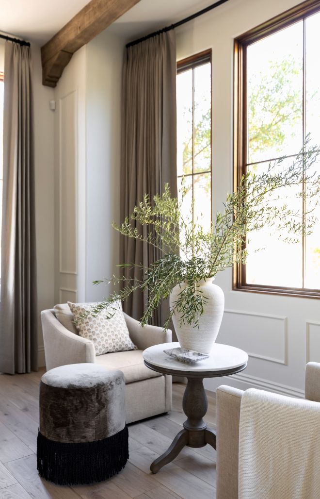 custom upholstered ottoman with fringe detail in a luxury home in Arizona